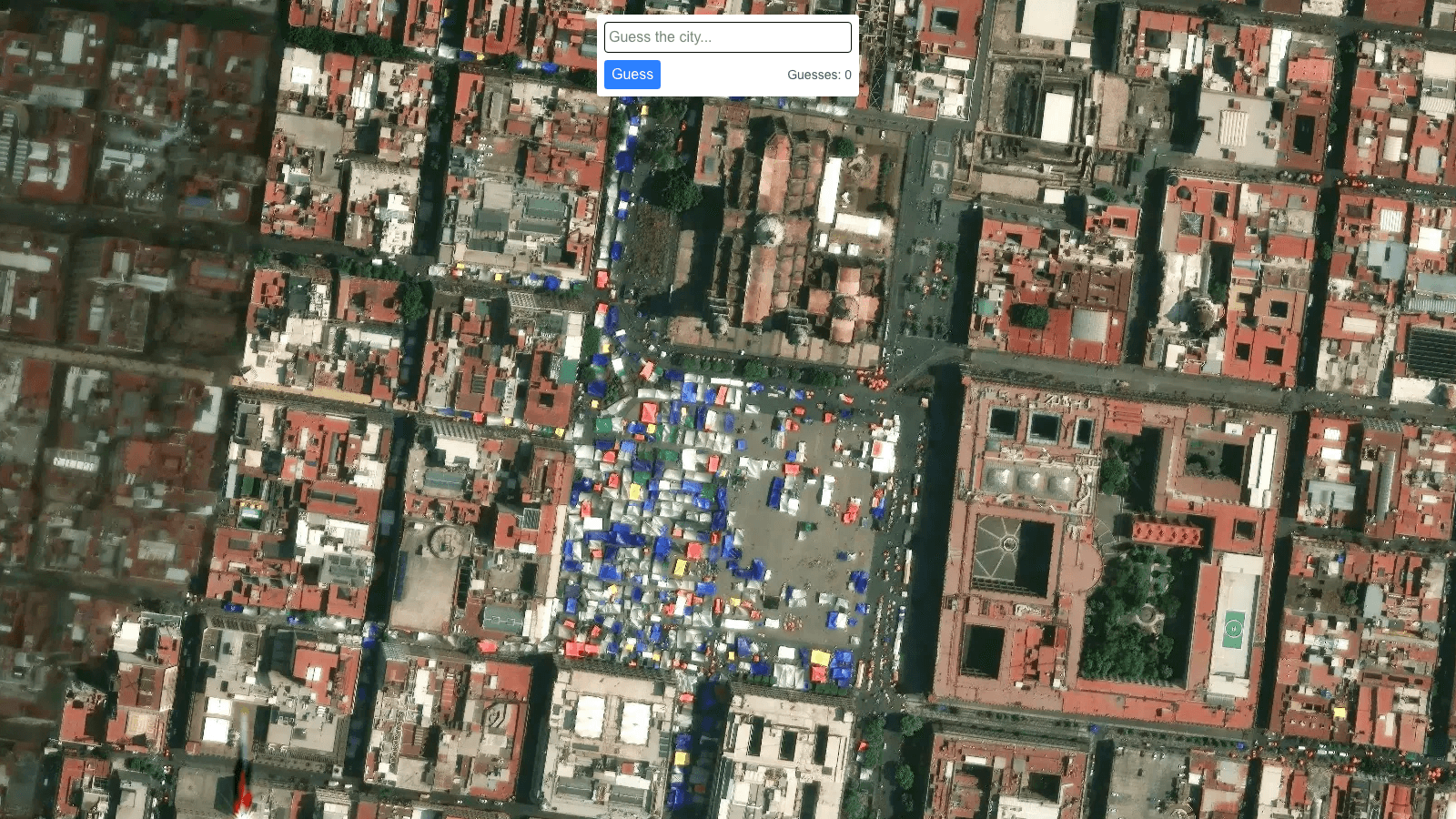 Satellite Guesser desktop view with a satellite map and a small city guess input
